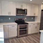 kitchen remodel blue backsplash oven