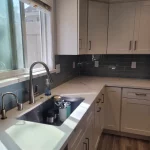 kitchen remodel blue backsplash sink