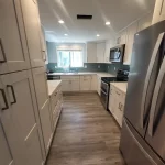 kitchen remodel blue backsplash hallway