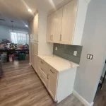 kitchen remodel blue backsplash white cabinets