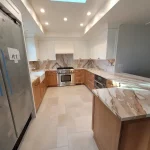 kitchen remodel in process white cabinets