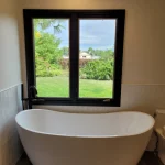 tub and window in bathroom remodel