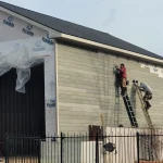 Construction of a outdoor building men working