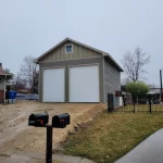 Construction of a two door garage mail box in shot